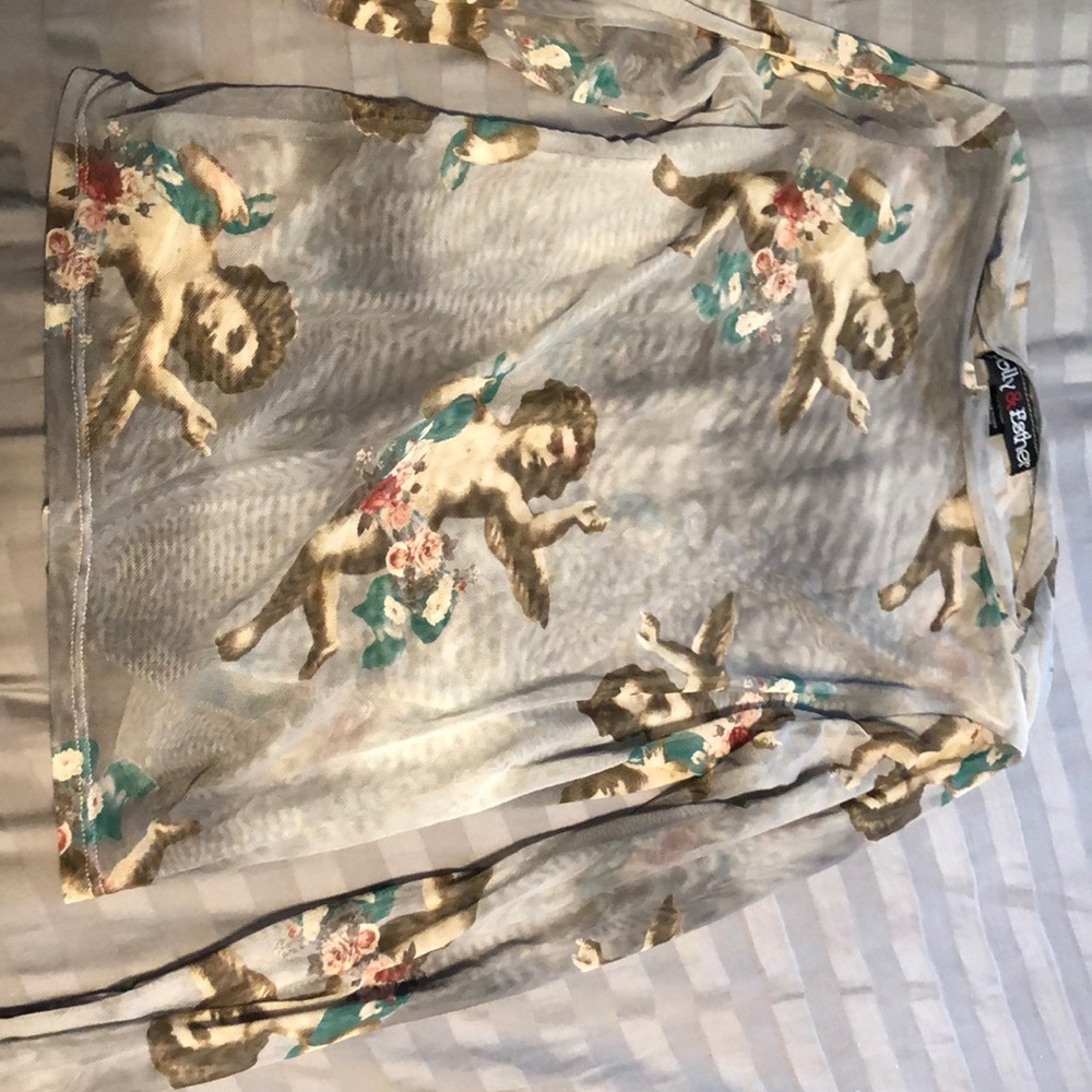 Polly & Esther, see though angel long sleeve shirt